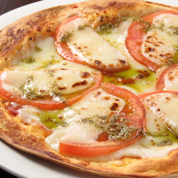 Perfect match with wine! Tomato and mozzarella cheese pizza