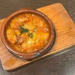 Spicy tomato stew with intestines and onions