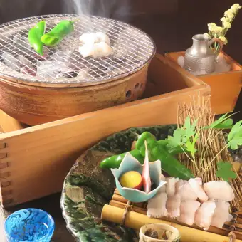 Grilled Kyoto vegetables and conger eel over charcoal