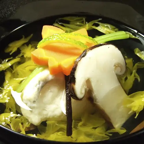 Matsutake mushroom and conger eel dumpling in a chrysanthemum-shaped bowl