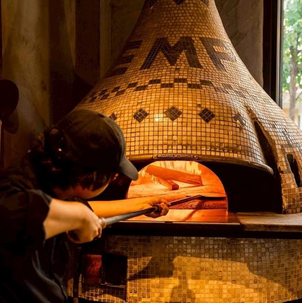 Our popular menu item: Pizza baked in our own stone oven