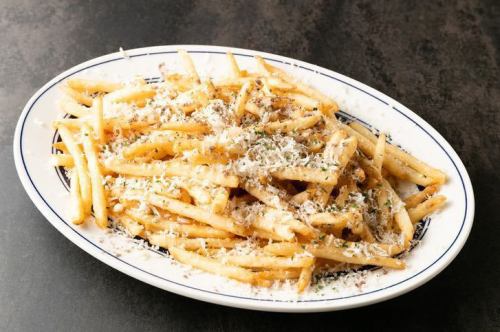 Fried potatoes with truffle cheese