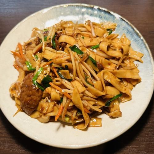 Cantonese style plate rice noodles stir-fried over high heat