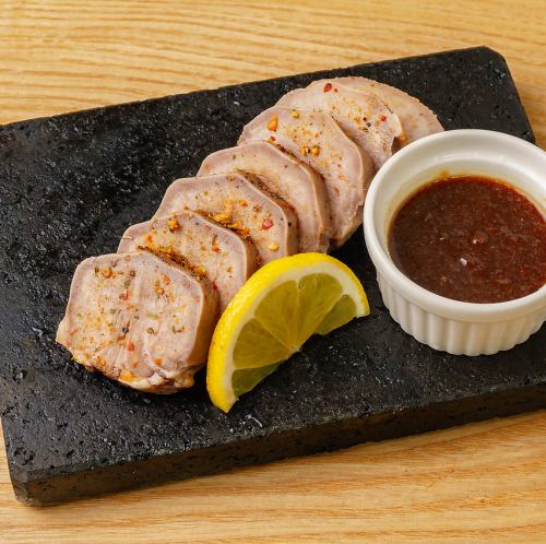 Lava-grilled black pork tongue