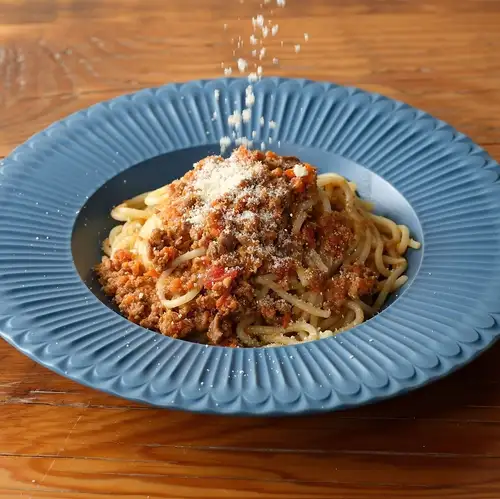 Bolognese with a mountain of cheese