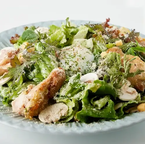 Caesar salad with soft-boiled egg and salt koji lemon marinated chicken