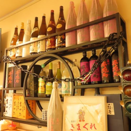 店主對他的清酒架感到非常自豪！