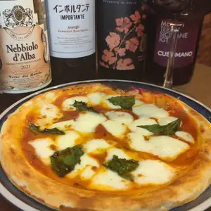 A Margherita pizza with meltingly decadent cheese.