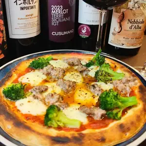 Homemade salsiccia and broccoli pizza
