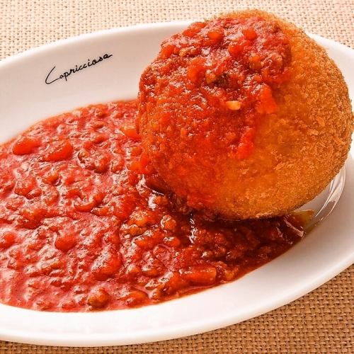 Sicilian-style rice croquettes with meat sauce