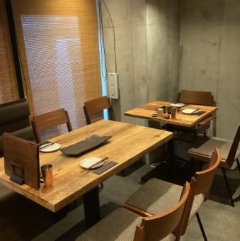 The relaxed table seating at the back of the restaurant can accommodate parties of up to 18 people.