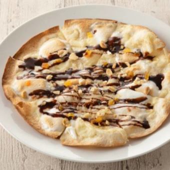 Dessert pizza with raw chocolate and marshmallow