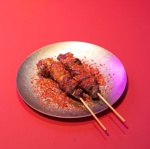 2 skewers of lamb (yangrouchuan)