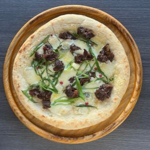 Beef cheek and green onion pizza