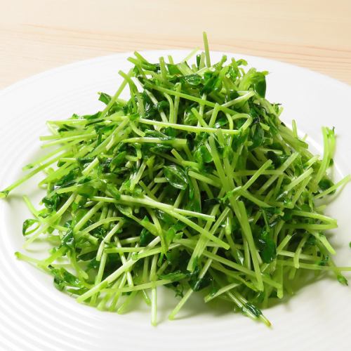 Fried pea sprouts with garlic