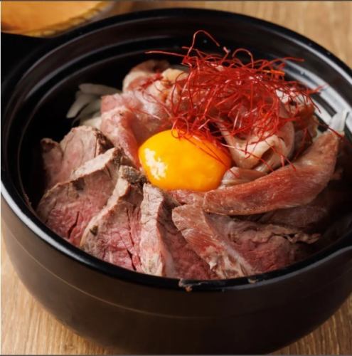 Japanese beef and soft-boiled egg in clay pot rice