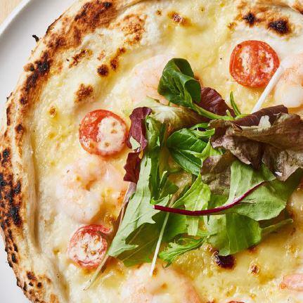 Camembert pizza with cherry tomatoes and shrimp