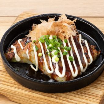 Fluffy grilled yam in an iron pot