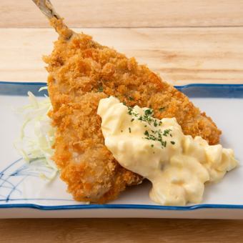 Fried horse mackerel served with egg sandwich filling