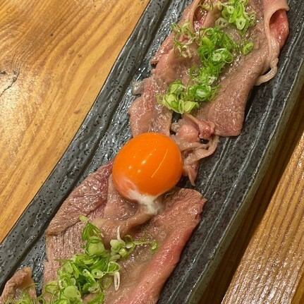 Domestic marbled wagyu beef topped with grilled egg yolk