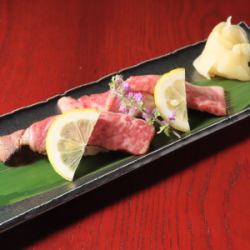 モモ肉の炙り握り 1貫 