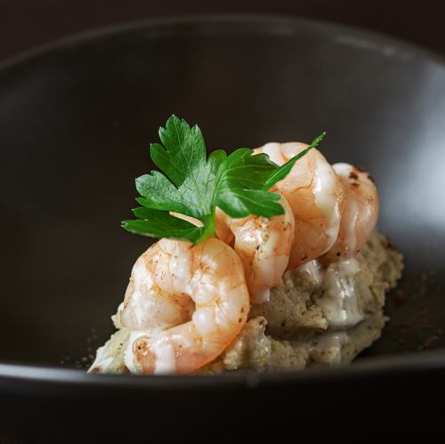 Potato salad with plump shrimp and truffles