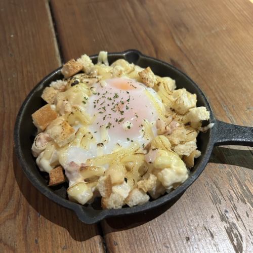 Roasted potato salad with hot spring egg and cheese