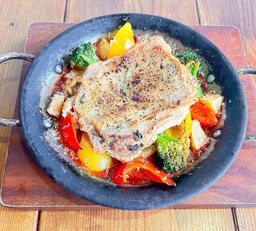 Oven-baked herb chicken and colorful vegetables