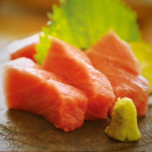 -sliced raw fish-