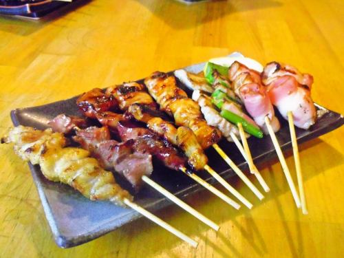 Carefully take each skewer