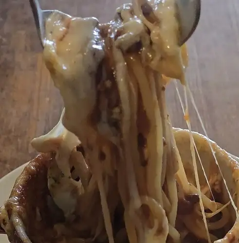 Autumn eggplant and bacon tomato volcano pasta