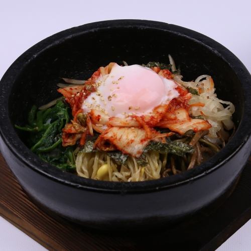 Stone-grilled kimchi and egg bibimbap