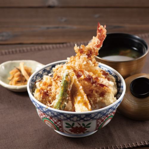 Bowl of rice and fried fish