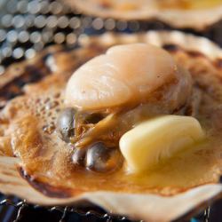 Grilled scallops in butter and soy sauce