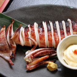 Whole charcoal grilled squid