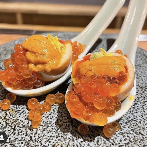 Boiled egg topped with sea urchin salmon roe