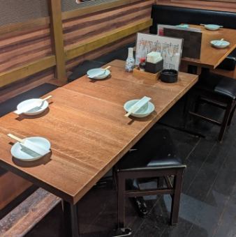 [Table seats] We have two tables that can accommodate 2-4 people. You can connect the two seats together to seat up to 8 people.