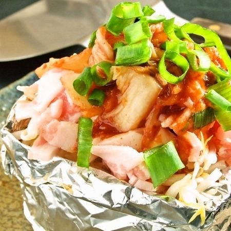 Stewed pork kimchi in foil