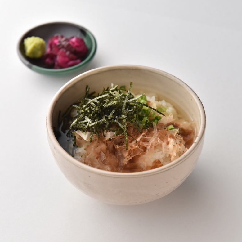 Ochazuke (rice with tea) with plum, salmon and seaweed