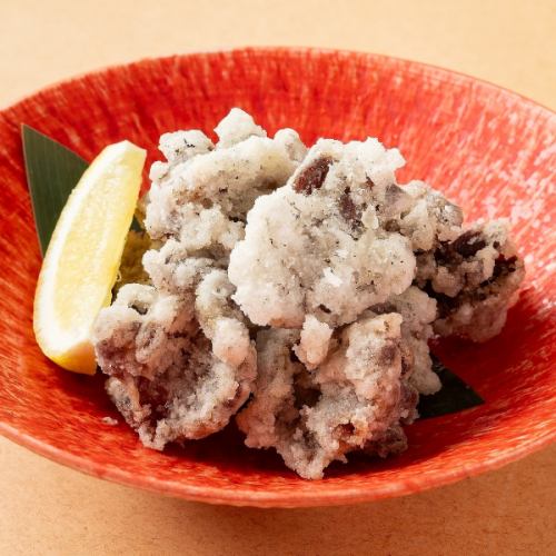 Deep fried gizzard shad with white spices