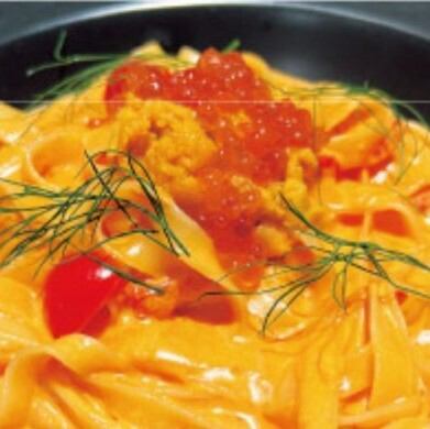 Tagliatelle with sea urchin and salmon roe in tomato sauce