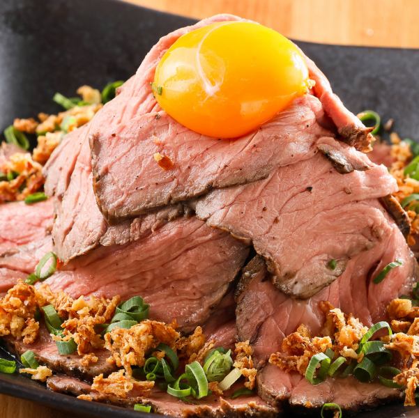 A delicious low-temperature cooked mountain roast beef (topped with egg yolk) made fresh in-house every day with our beloved pork!