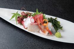 Five pieces of raw fish sashimi