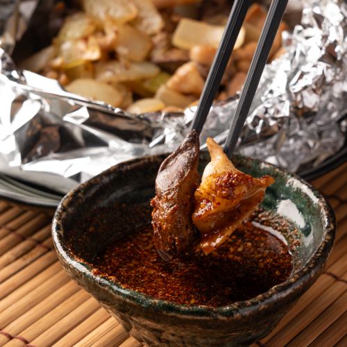 ホルモンミックス焼き～特製辛味ソース～