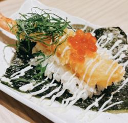 Shrimp tempura hand roll with salmon roe