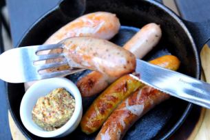 Assorted sausages with mustard