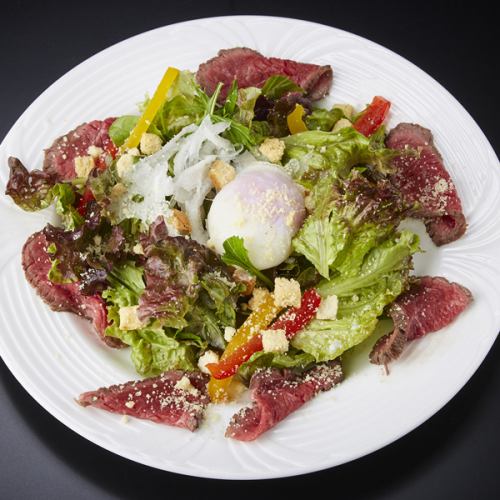 Caesar salad with hot spring eggs and roast beef