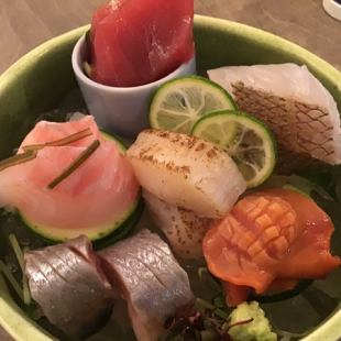 Assortment of four types of sashimi