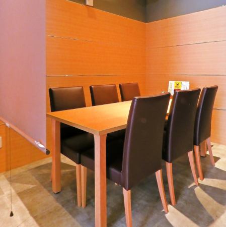 Semi-private room-style table for 6 people separated by a roll curtain