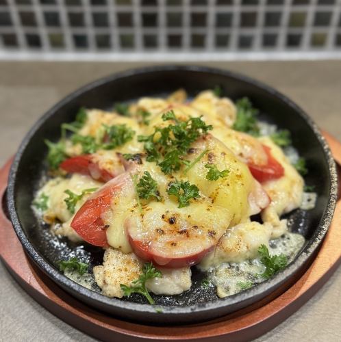 Tender chicken breast baked with tomato and cheese
